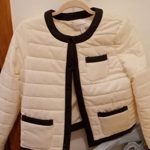 Cream and black button down jacket by Pop Sugat